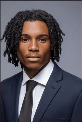 A professional headshot of Kevin Wright